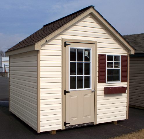 Garden Shed Yellow Beige and Dark Begie with Dark Roof